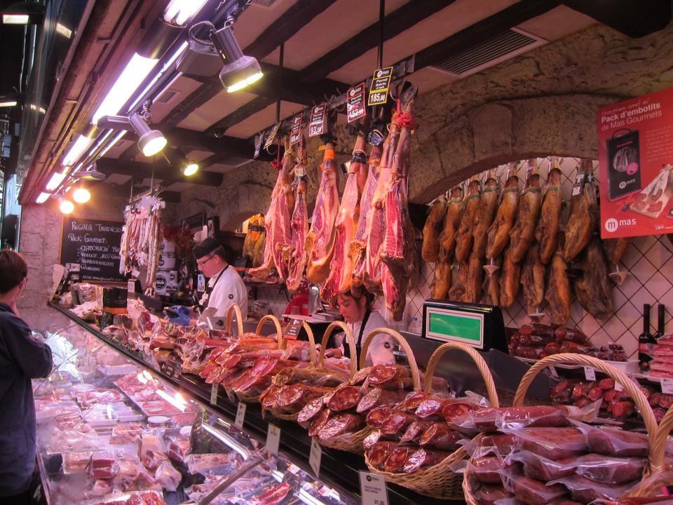 Barcelona is famous for its ham, and no type is more famous than the "jamón ibérico," or Iberian Ham, that literally melts in one's mouth. Here, a butcher displays the many options available for the day.