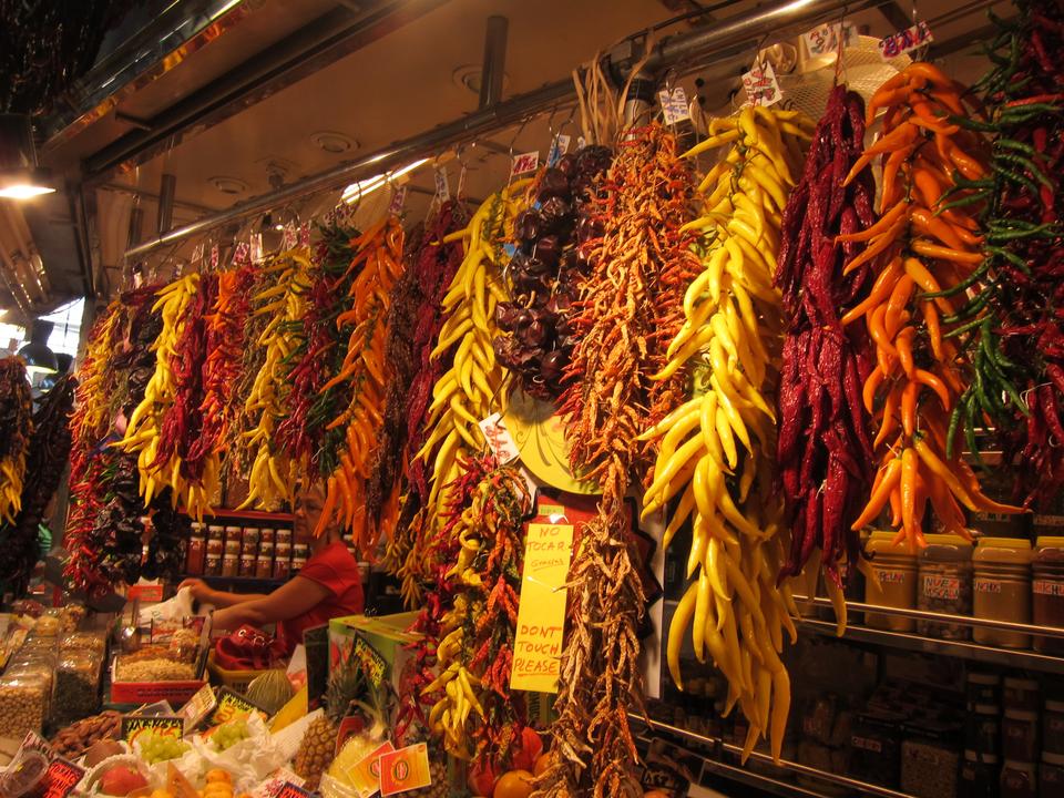 Spices can be bought by the bottle, bag, or string! Here, a wide variety of peppers are on display for those who want to try some of Catalan's locally grown fare. 