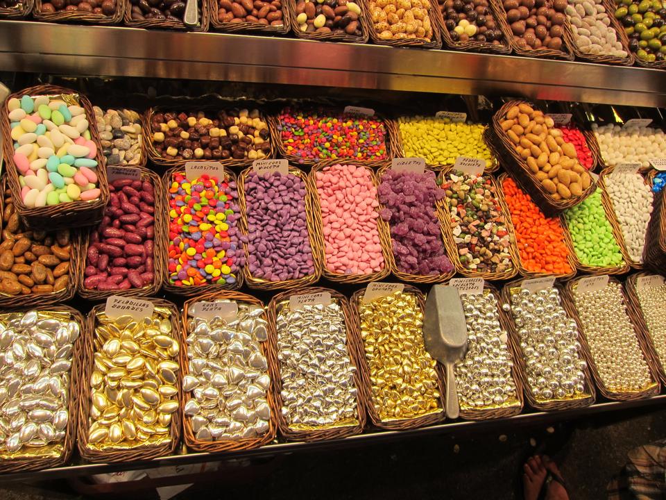 A candy vendor displays his colorful products for all to see—and try. 