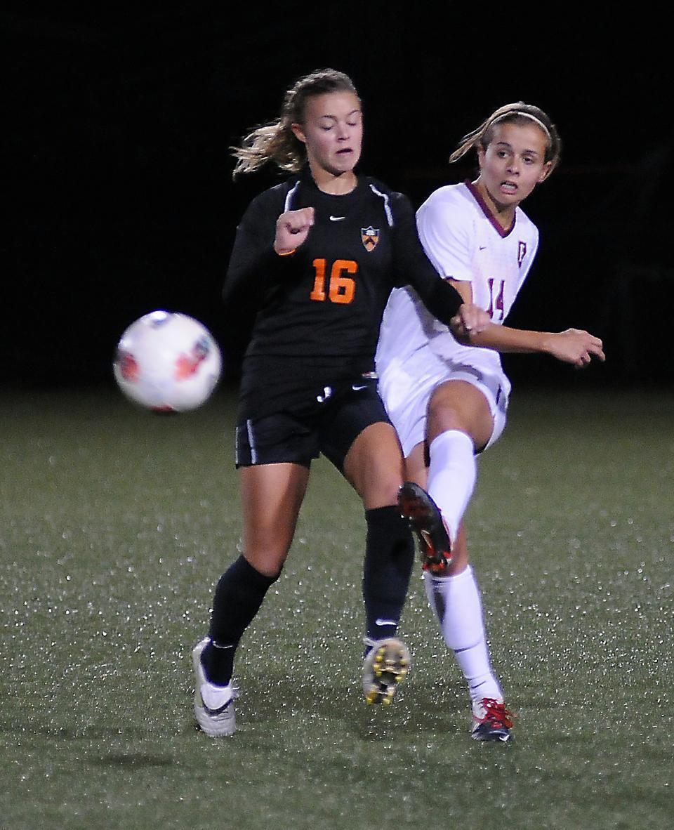 In her first game as co-captain, junior Peyton Johnson, shown above in earlier action, notched a goal and an assist in the Harvard women's soccer team's 2-0 win against UMass on Friday.