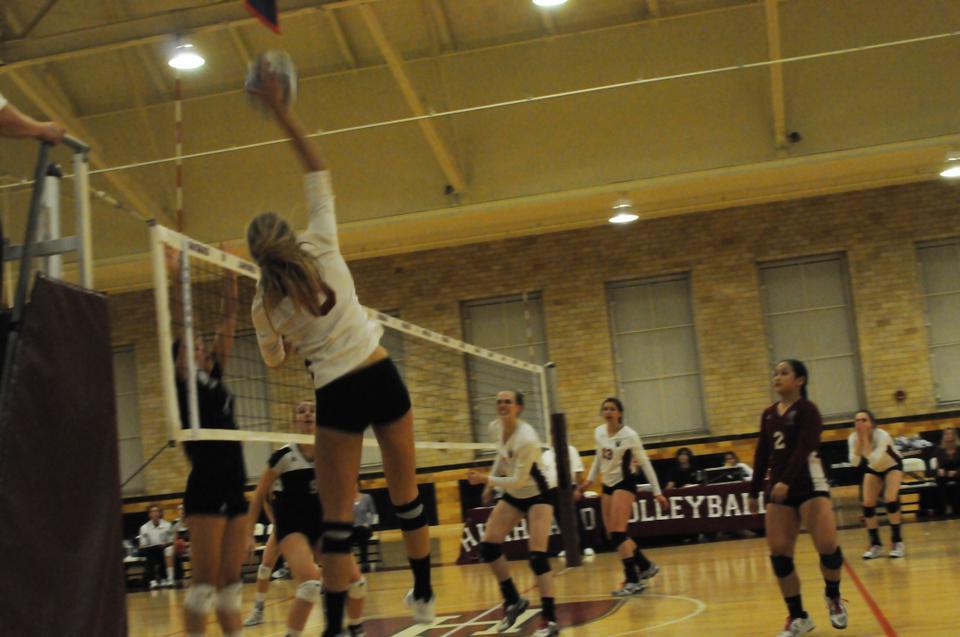 Co-captain Taylor Docter, shown above in earlier action, led the Harvard women's volleyball team with 31 kills over the weekend at the Hokie Invitational. But it was not enough to keep the Crimson from suffering a trio of losses in two days.