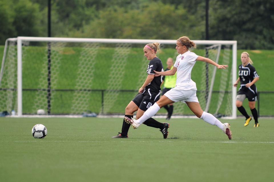 Junior co-captain Peyton Johnson, shown above in earlier action, handed out an assist during the Harvard women's soccer team's 3-1 loss to Dayton on Friday at Soldiers Field Soccer/Lacrosse Stadium.