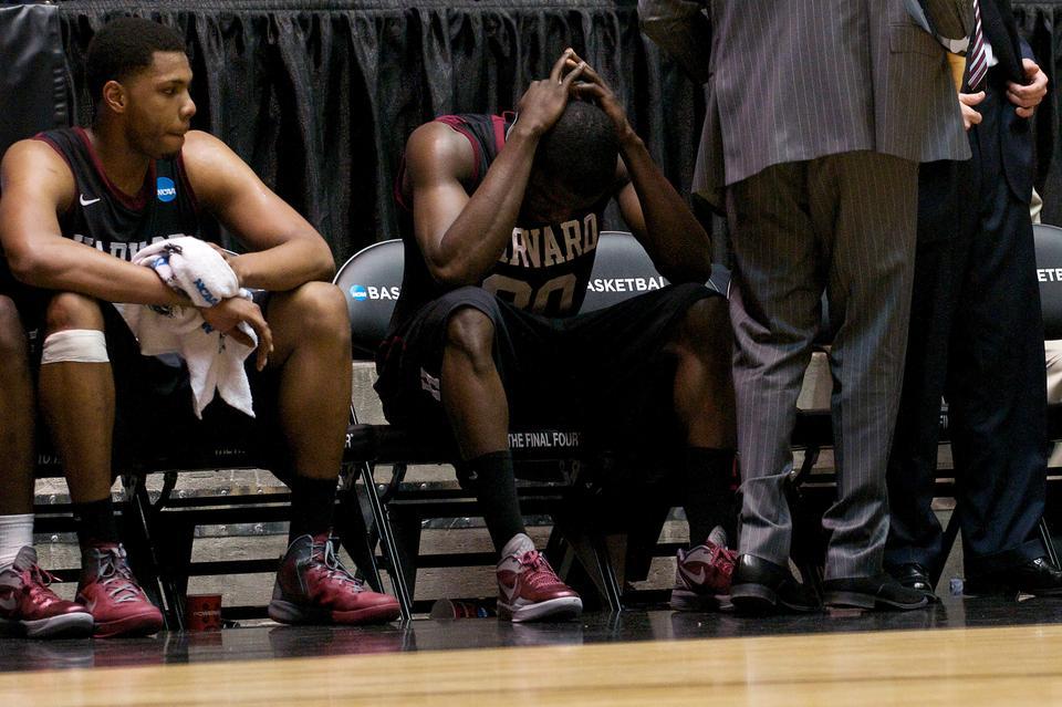 A distraught Kyle D. Casey '13 clasps his head in his hands in the waning moments of the Harvard men's basketball team's 79-70 loss to Vanderbilt in last year's NCAA tournament. Implicated in the Government 1310 cheating scandal, Casey has decided to withdraw from the College, according to Sports Illustrated. 
