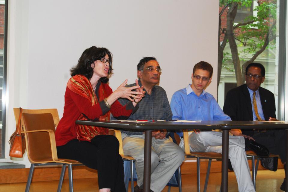 Malika Zeghal, Professor of Contemporary Islamic Thought and Life, discusses the current crisis surrounding the Middle East on Tuesday evening on a panel with fellow Professors Ali Asani and S. Allen Counter, along with a student representative from the Harvard Islamic Society. 