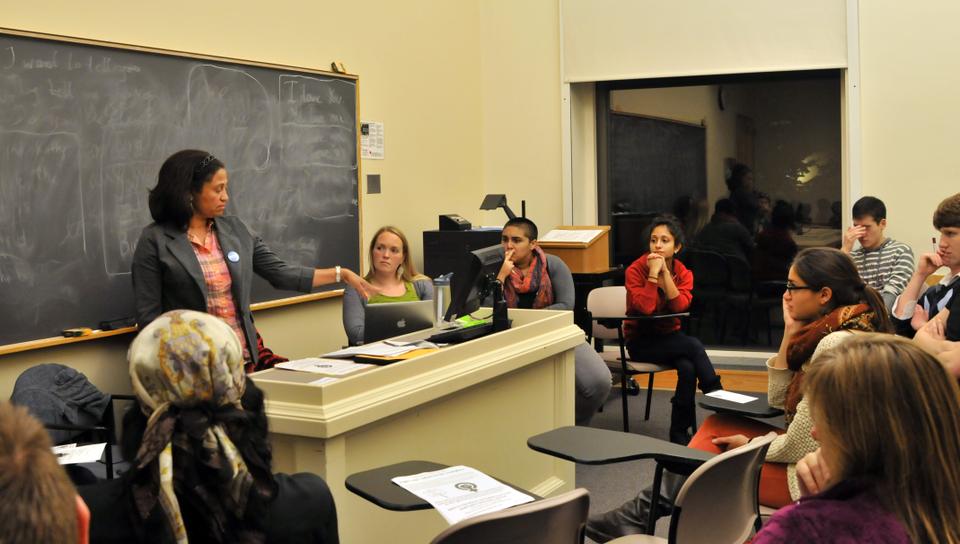 Johany Pilar, a mail clerk in the Science Center Mail Center, shares her experiences of sexual harassment, indifference, and discrimination in the workplace to members of the Harvard community gathered for a discussion on rape culture.