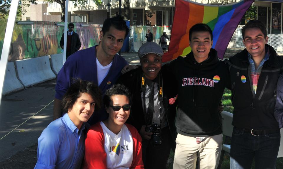 Office of BGLTQ Student Life Director Van Bailey and a group of students hold Morning Celebrations for National Coming Out Day at the Memorial Hall Lawn on Thursday. They cheerfully demonstrated support and advocacy for National Coming Out Day.