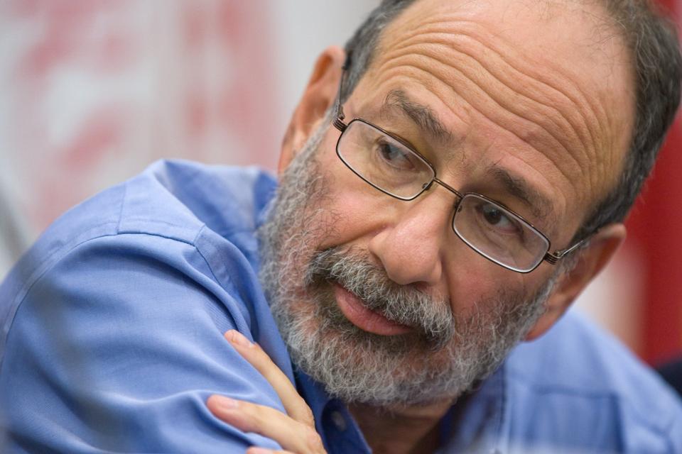 Harvard Business School professor Alvin Roth who is currently a visiting professor at Stanford University, listens at a press conference announcing his award of a shared Nobel Memorial Prize in Economic Sciences on Monday. He shares the prize with Lloyd Shapley, professor emeritus at UCLA.