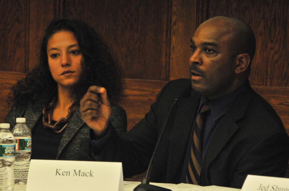 Ken Mack (right), professor at Harvard Law School, discusses the current presidential campaign's focus on government's involvement in the economy. He and Elizabeth Hinton (left), a Postdoctoral Scholar in the Michigan Society of Fellows, were two of five panel members to speak in the History department's round-table presentation, "Law, History, and the 2012 Election."