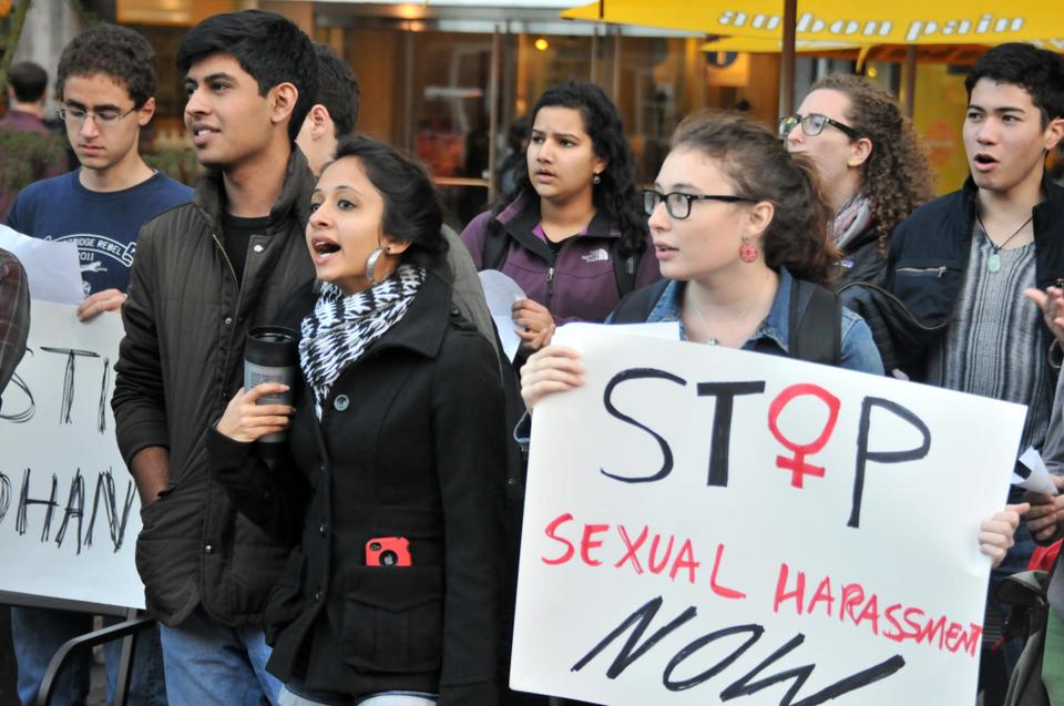 Inspired by Johany Pilar, a worker in Harvard's Mailroom, the Harvard community gathers at the Holyoke Center to protest sexual harassment.