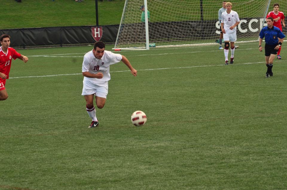 Senior forward Zack Wolfenzon, shown here in earlier action, scored his third goal of the season on Saturday, as the Harvard men’s soccer team dropped a key Ivy League contest to Princeton, 2-1, in double overtime. 