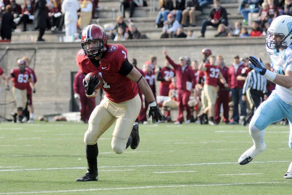 Junior safety Chris Splinter races toward the end zone after picking off Columbia quarterback Sean Brackett in the Harvard football team's contest Saturday against Columbia. Splinter's interception was one of two by the Crimson defense in the second quarter of the contest.