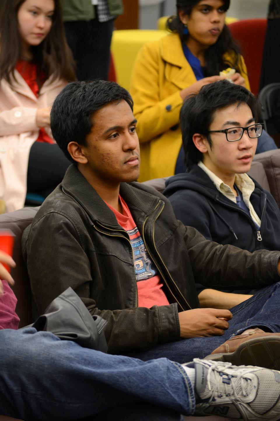 Michael George '14 listens intently to the transportation service's words on the current plans to improve weekend morning services. As Student Life Committee Chair within the Undergraduate Council, he organized the event in the format of a "Town Hall" with an open forum for students concerns.