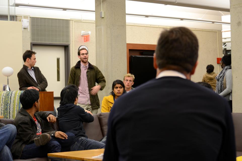 David E. Harris Jr. listens to the concerns of students at the Undergraduate Council's Town Hall Event regarding Harvard's shuttles. As the general manager of Harvard Transportation Services, his major concern is the safety of the students.
