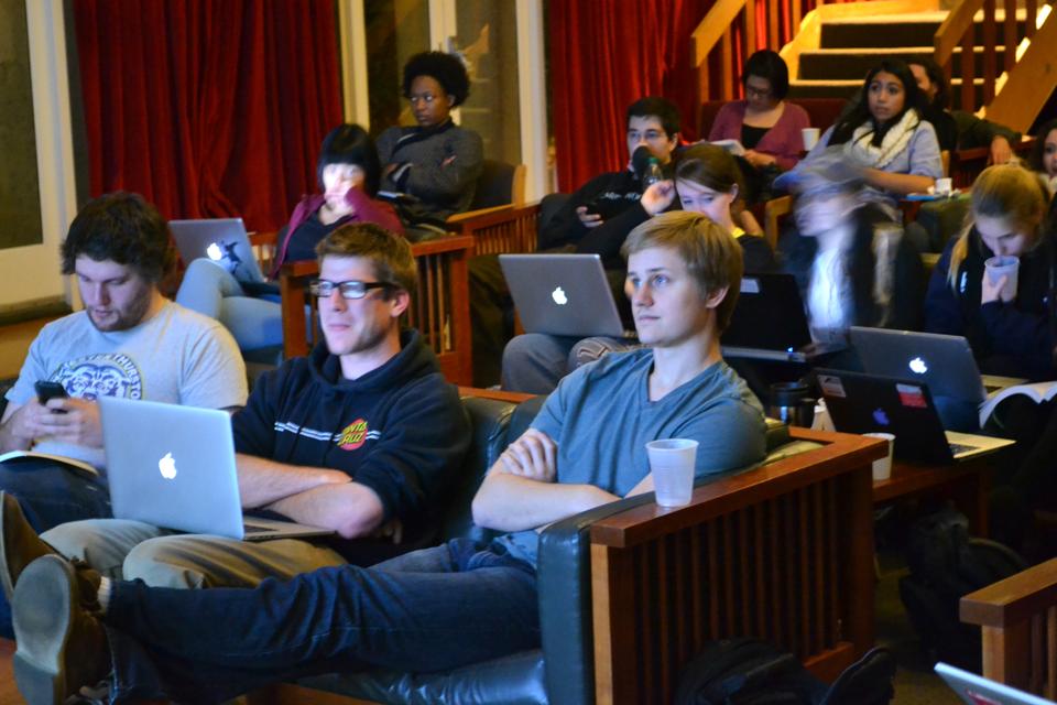 Students watch presidential election results in the Currier Fishbowl