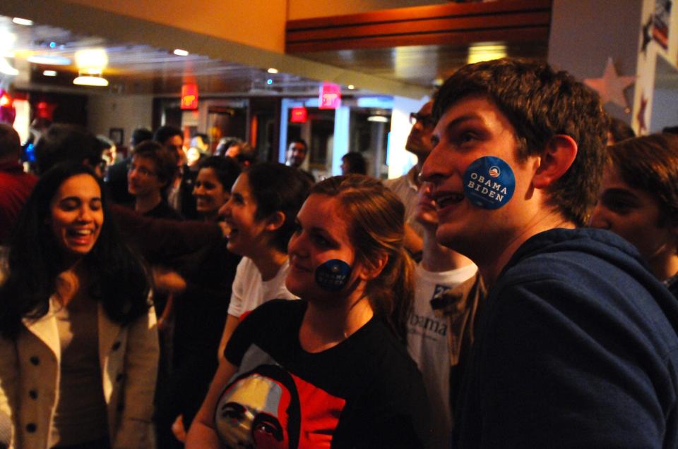 Enthusiasm of the Obama supporters at the IOP watch party increases as Obama wins in more and more states.