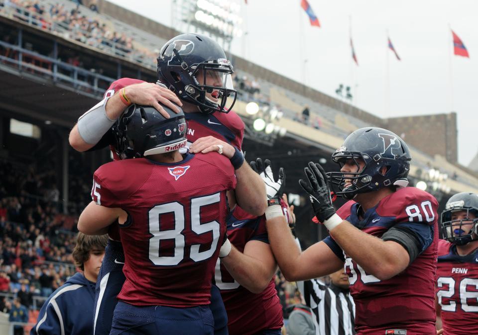 The Penn football team celebrates one of its three first-half touchdowns in a 30-21 victory over Harvard on Saturday afternoon in Philadelphia, Pa. 