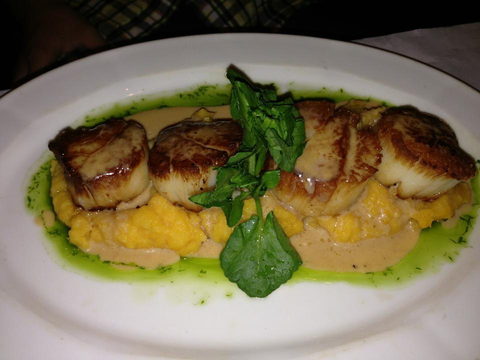 Pan Seared Diver Scallops ($30) over butternut squash puree.