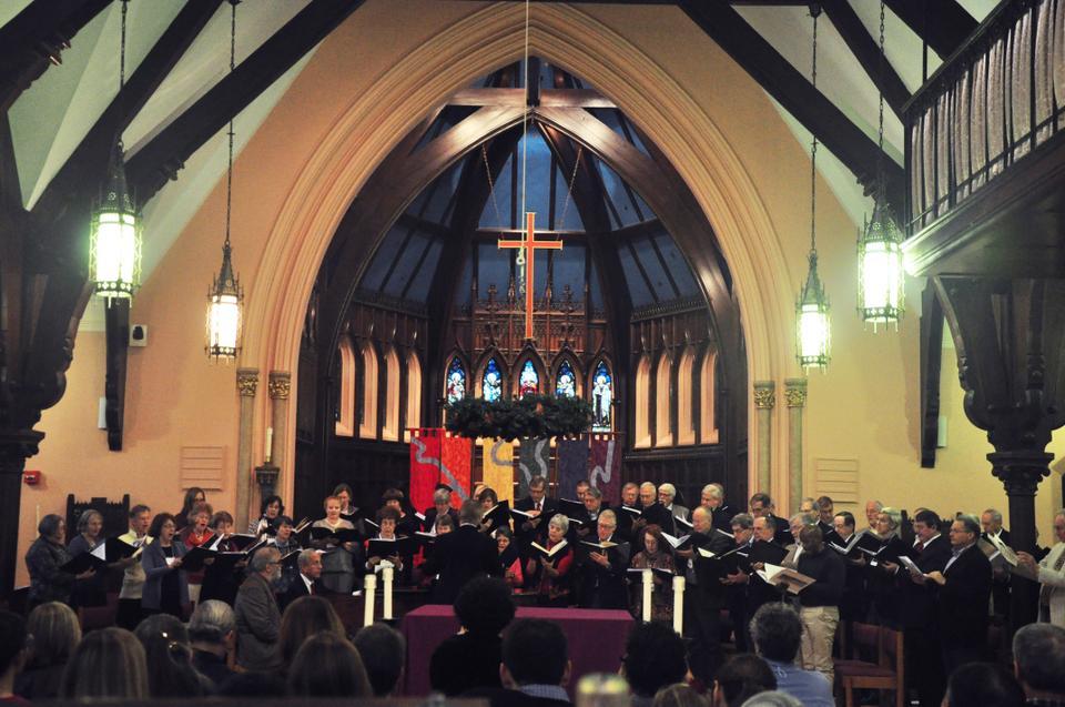 Former members of the Harvard Glee Club and the Radcliffe Choral Society perform at St. John's Chapel on Sunday. The singers celebrated the 45th Anniversary of their 1967 combined HGC/RCS Asian Tour.