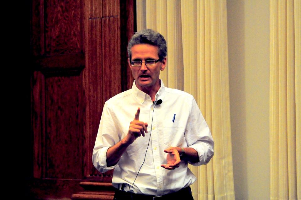 Journalist Paul Salopek describes the importance of walking at the Out of Eden talk in the Barker Center. He plans to walk approximately 21,00 miles as he retraces the original path of  humans out of Africa.  