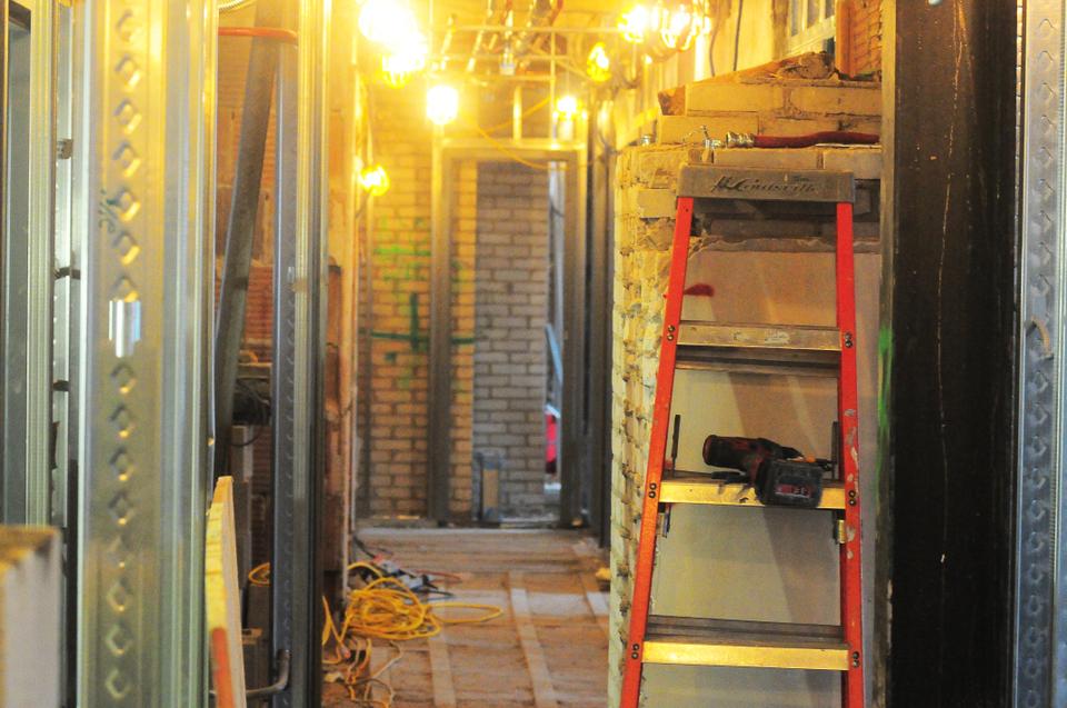 The insides of Quincy are bare and spooky, but construction is well under way and should be done around mid-August 2013. 
