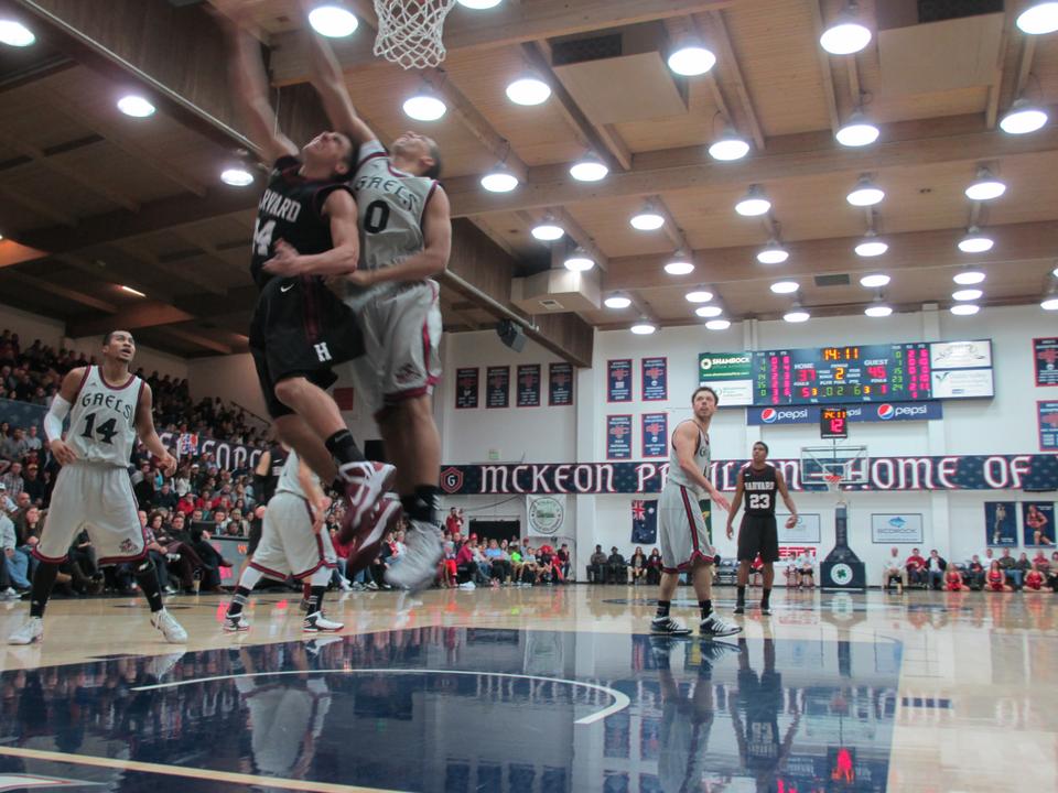 Sophomore Jonah Travis makes a tough layup from under the basket.