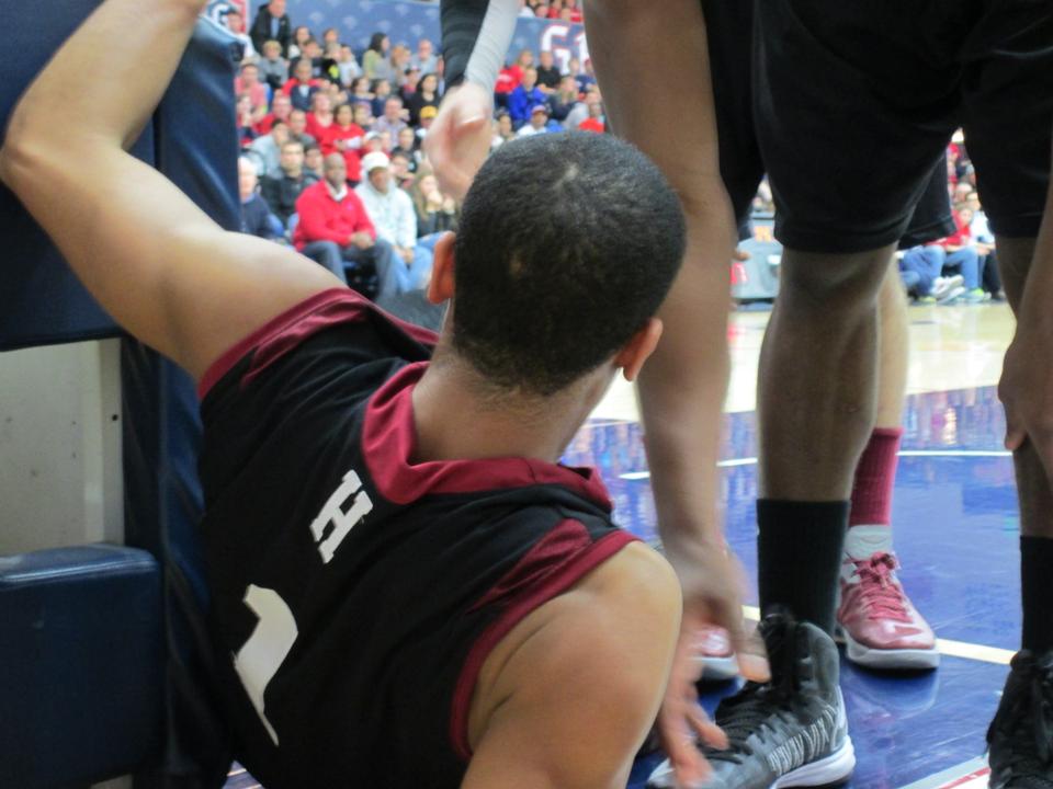 Siyani Chambers recovers after getting knocked down on his way to the basket early in the second half. 