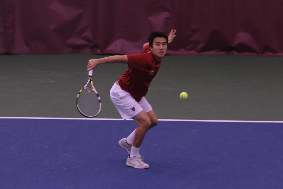 Co-captain Andy Nguyen, shown here in earlier action, was part of a winning double duo in last season's campaign. Harvard's doubles squads continued their success this weekend, coming up victorious in 18 of their 20 matches.