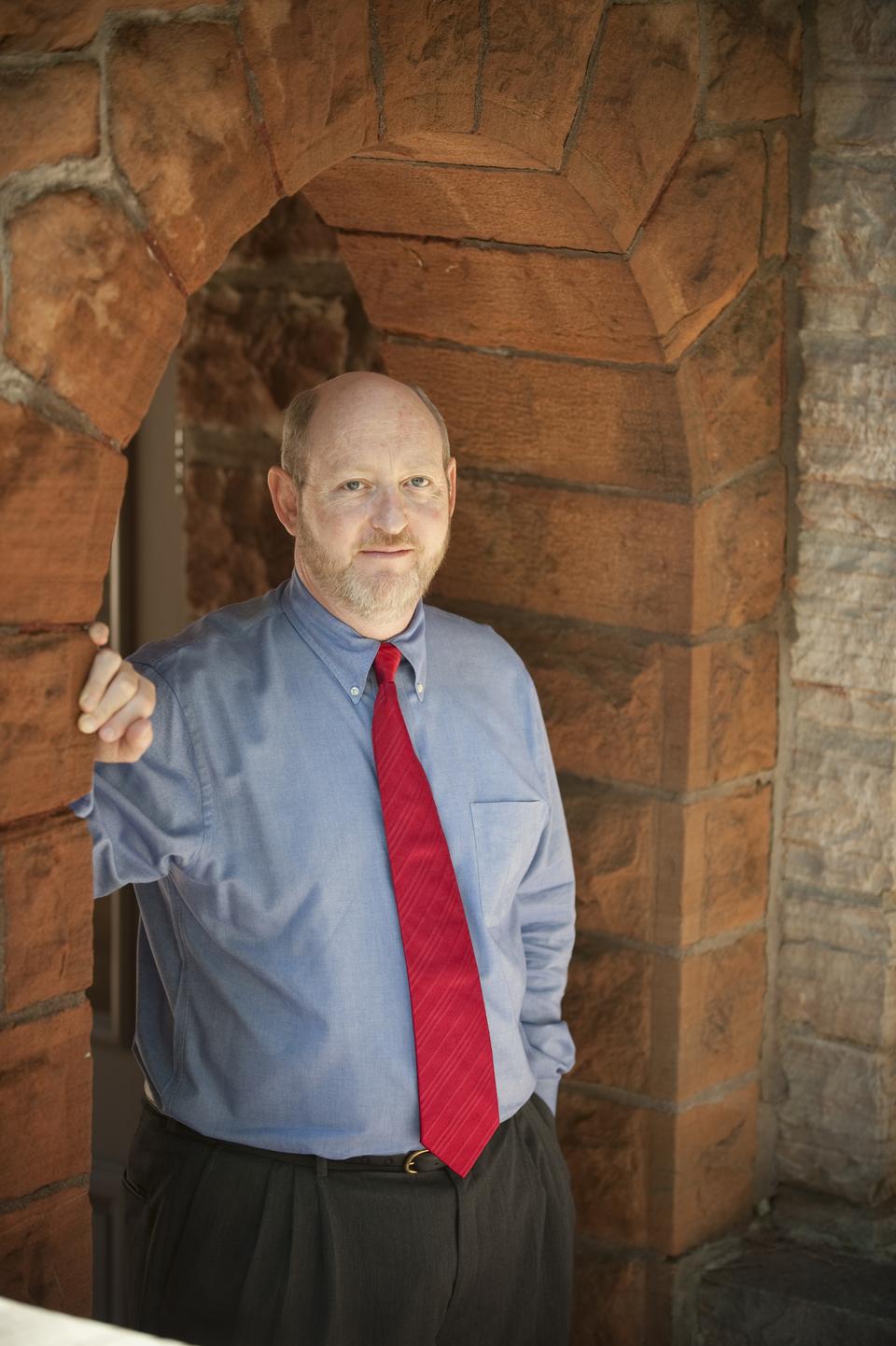 Dean of the Division of Continuing Education and Extension School Huntington D. Lambert.