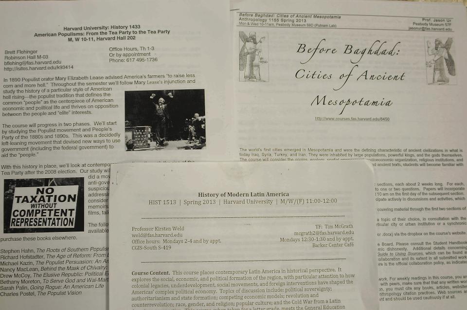 Students collect syllabi on the first day of shopping week Monday. As a result of the Government 1310 cheating scandal, all professors were required to include on their syllabi an explicit collaboration policy.