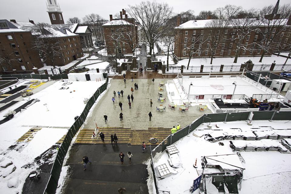 Students walk by renovation near the Science Center. Begun last May, construction on a new common space is currently ahead of schedule.