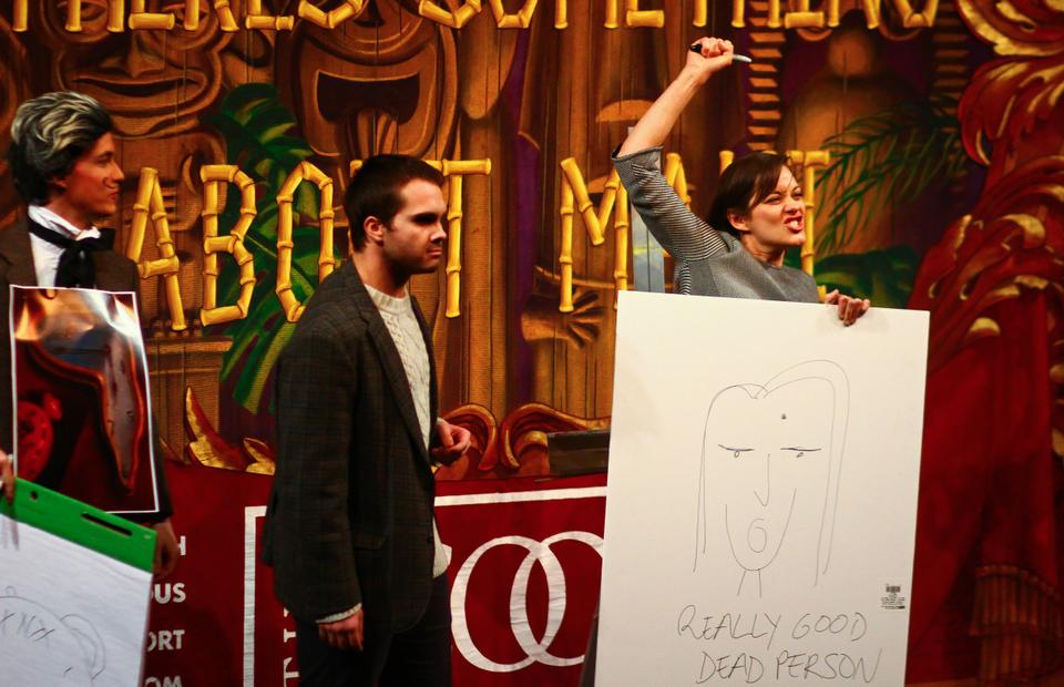 Marion Cotillard celebrates her victory in a self-portrait contest during her roast. 