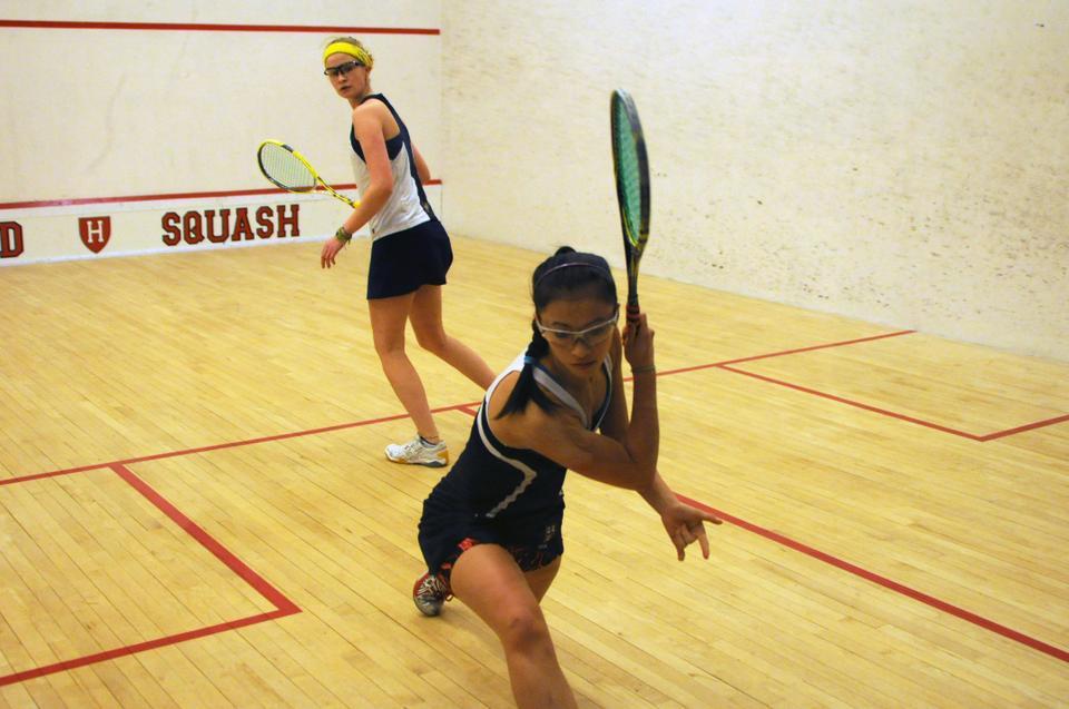 Sophomore Julianne Chu, shown here in previous action, defeated Brown’s Skylar Murphy in straight sets, 11-5, 11-7, 11-3, on Friday. The Crimson swept the Bears, 9-0, only dropping two sets in the process. Chu is 7-0 this season, one of seven undefeated Harvard women.