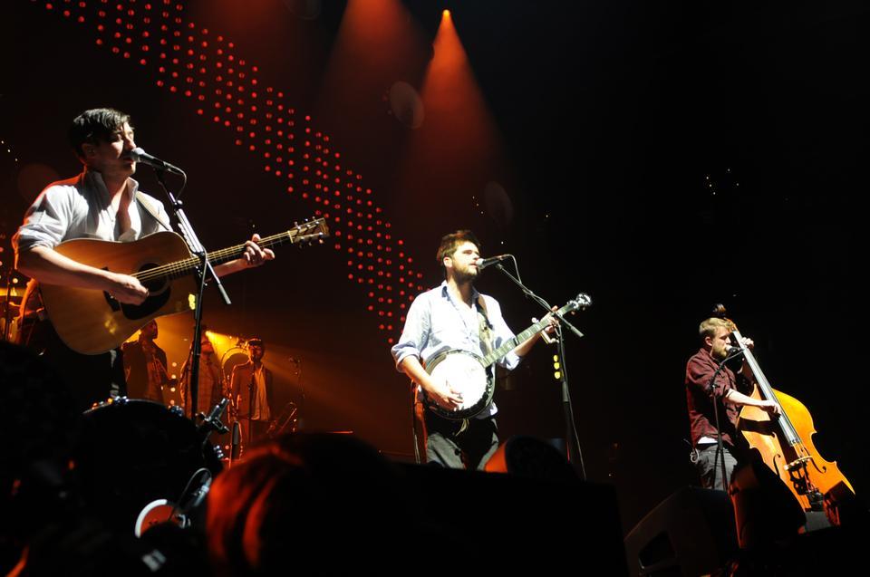 Fans scream and take pictures of the band. Mumford & Sons are known for their energetic and thrilling performances; attendees were not disappointed.  