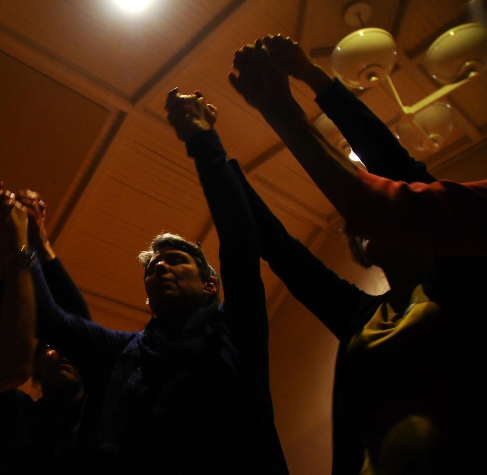 As part of One Billion Rising, a worldwide movement in the name of violence against women, dancers at Unitarian Universalist Church participate in a Sacred Circle Dance on Thursday night. 