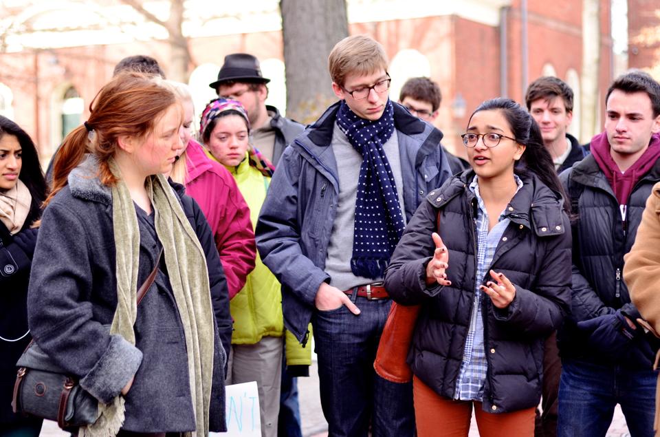 Undergraduate Council President Tara Raghuveer '14 voices her support of the Mental Health Rally outside of Massachusetts Hall on Friday afternoon. A large crowd gathered at 2 p.m. to address the concerns surrounding Harvard's current Mental Health policy.
