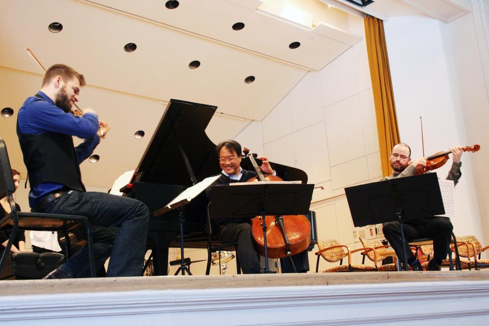 On Saturday afternoon, Yo-Yo Ma '76 plays with the Silk Road Ensemble as a part of the Cultural Citizenship Symposium, cosponsored by the Mahindra Humanities Center at Harvard. The music accompanied a panel discussion that addressed the meanings and implications of modern cultural citizenship, belonging, and tradition. 