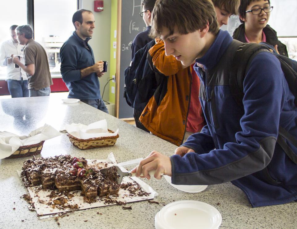 The Department of Mathematics celebrated Pi day with cake and refreshments for the community. Pi is used to represent the ratio of the circumference of a circle to its diameter, which is approximately 3.14159.