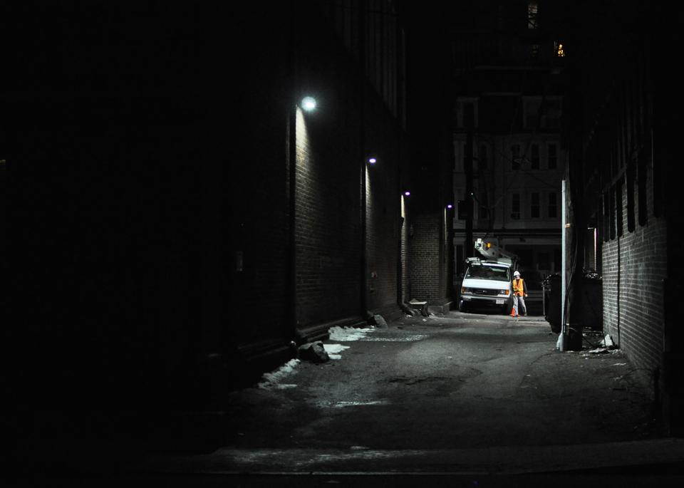 
Workers attend to a power outage on Plympton Street on Monday evening.  A circuit faulted leaving several Harvard Square businesses, The Crimson and residents of Hampden Hall swing housing without electricity. 
