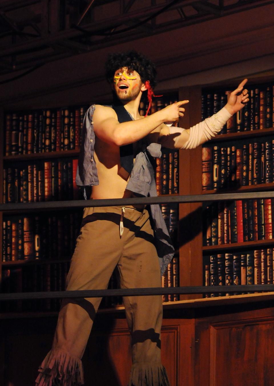 Joshua R. Wortzel '13 brings all of Puck's infectious energy and mischievous spirit from the fairy realms into this library setting of "A Midsummer Night's Dream." 
