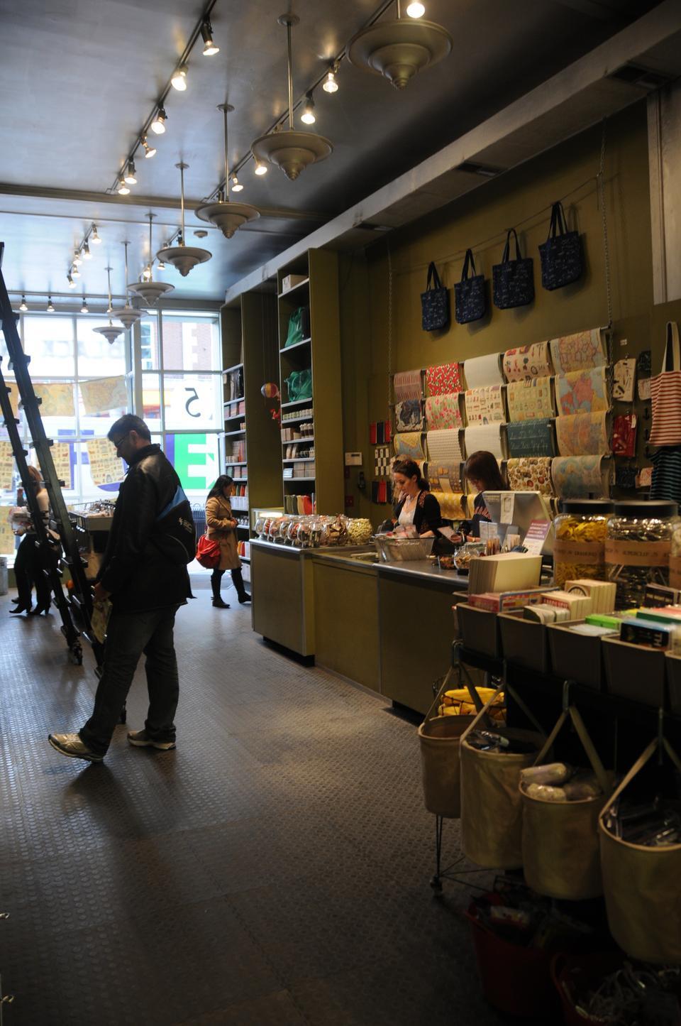 Can designing the interiors of stores and displays be considered an art?