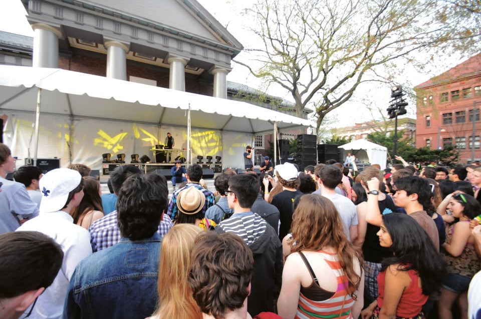 Yardfest attendees tune in to Das Racist, the three-man band that performed alongside the Cataracts at Harvard’s annual musical concert held last April in Tercentenary Theater.