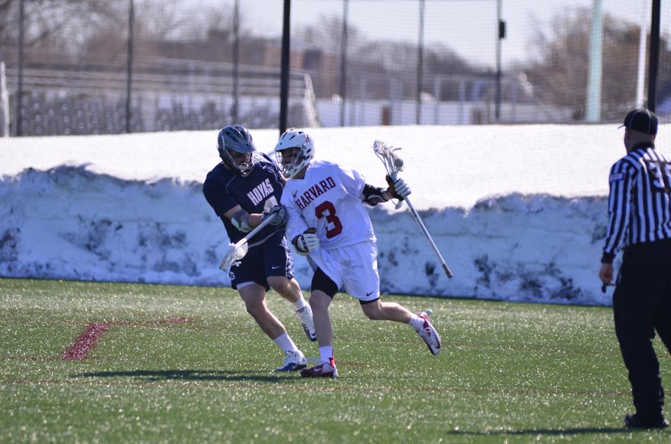 Freshman Attackman Devin Dwyer, shown here in earlier action, led a freshmen offensive barrage against Quinnipiac. In total, the Crimson’s freshmen players recorded eight goals and eight assists, accounting for most of Harvard’s eighteen goals in Tuesday’s win over Quinnipiac. 
