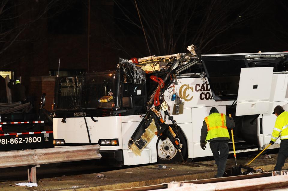 The roof of a charter bus was damaged following a crash on Soldiers Field Road on February 2, 2013. The State of Massachusetts is filing a criminal charge against the driver of the bus, Samuel J. Jackson.