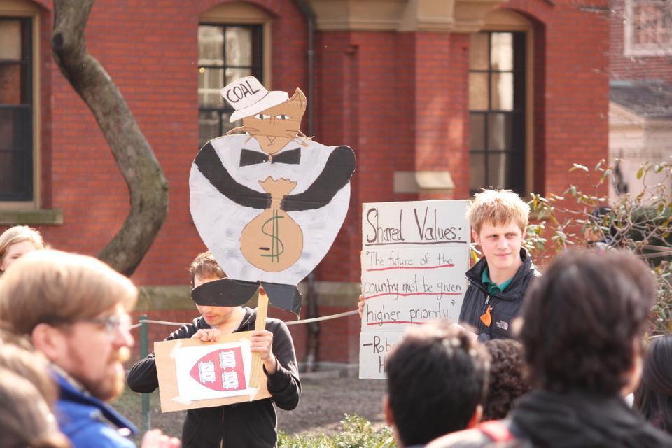 Thursday afternoon students assemble outside Massachusetts Hall to call for Harvard to divest from investments in Fossil Fuels.
