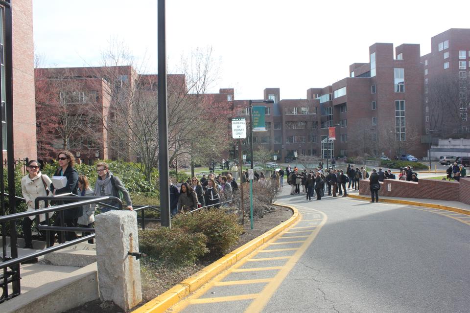 Harvard University evacuated the Kennedy School late in the afternoon, amid reports of unconfirmed bomb threats in the Cambridge area.
