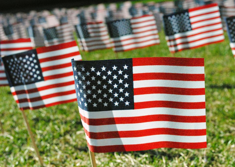 Harvard Undergraduates Honoring Veterans placed 349 American flags on the lawn in front of Memorial Hall on Wednesday. The flags honor the 349 U.S. veterans who take their own lives each year because of Post Traumatic Stress Disorder.