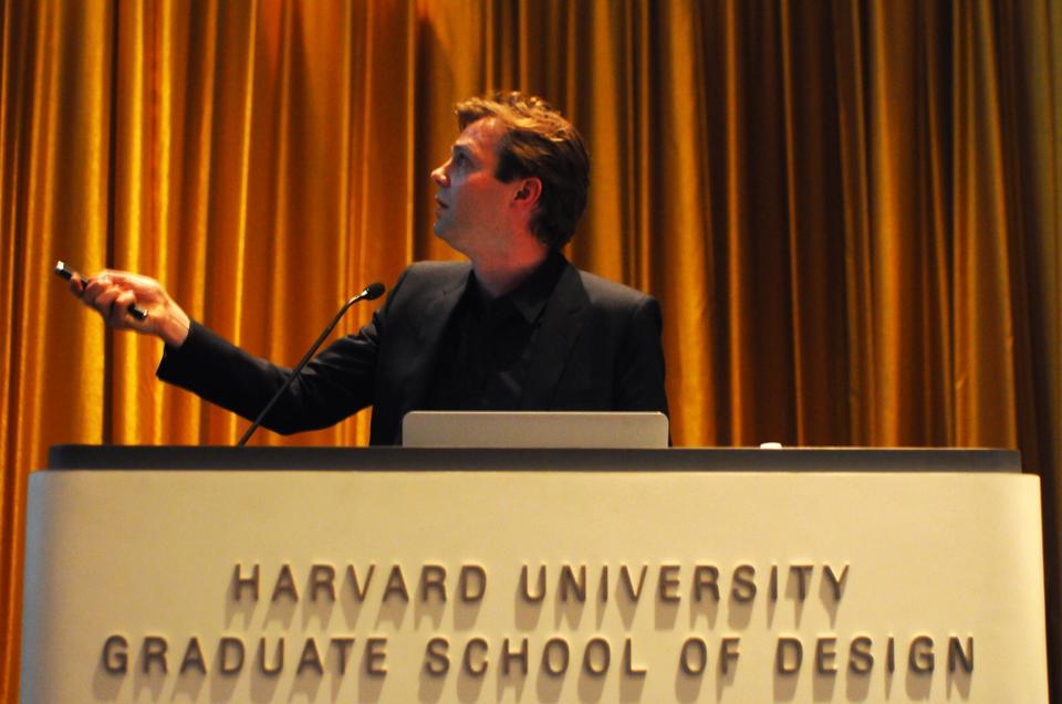 Bas Smets, the Principal of Bureau Bas Smets in Brussels in Belgium, gestures while explaining the contours of rivers in Europe. His lecture, entitled "Land vs. Landscape," in Gund Hall on April 18, explained his general approach to his work: interacting with preexisting land to create unique landscapes. 