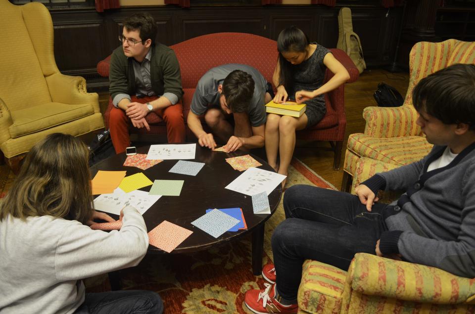 Students fold paper cranes in memory of the victims of the Boston Marathon bombings on Wednesday evening, Students met in Winthrop JCR with the goal of creating a thousand paper cranes in honor of victims and survivors.