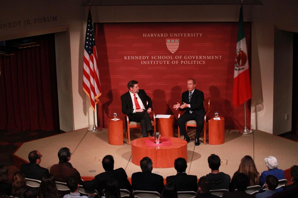 Felipe Calderon (right), the 56th President of Mexico (2006-2012) and the Inaugural Angelopoulos Global Public Leaders Fellow at the Harvard Kennedy School, speaks at the JFK Forum with David T. Ellwood (left), the Dean of Harvard Kennedy School. Calderon discussed a variety of issues, including Mexican economic interests, the level of violence in Mexico, and Mexico's role in Latin America.
