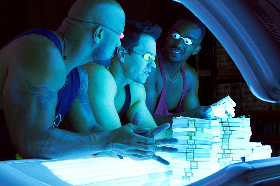 Dwayne Johnson, Mark Wahlberg, and Anthony Mackie star in Michael Bay's latest, "Pain & Gain."